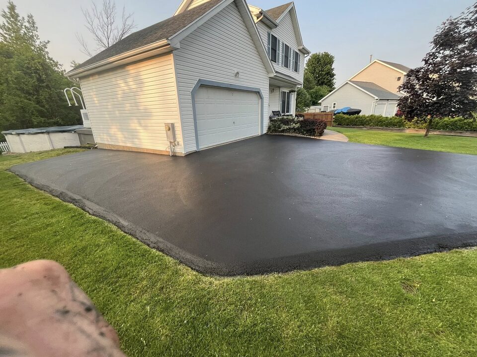 Asphalt driveway sealcoating job in Hilton, NY completed by Bold Seal